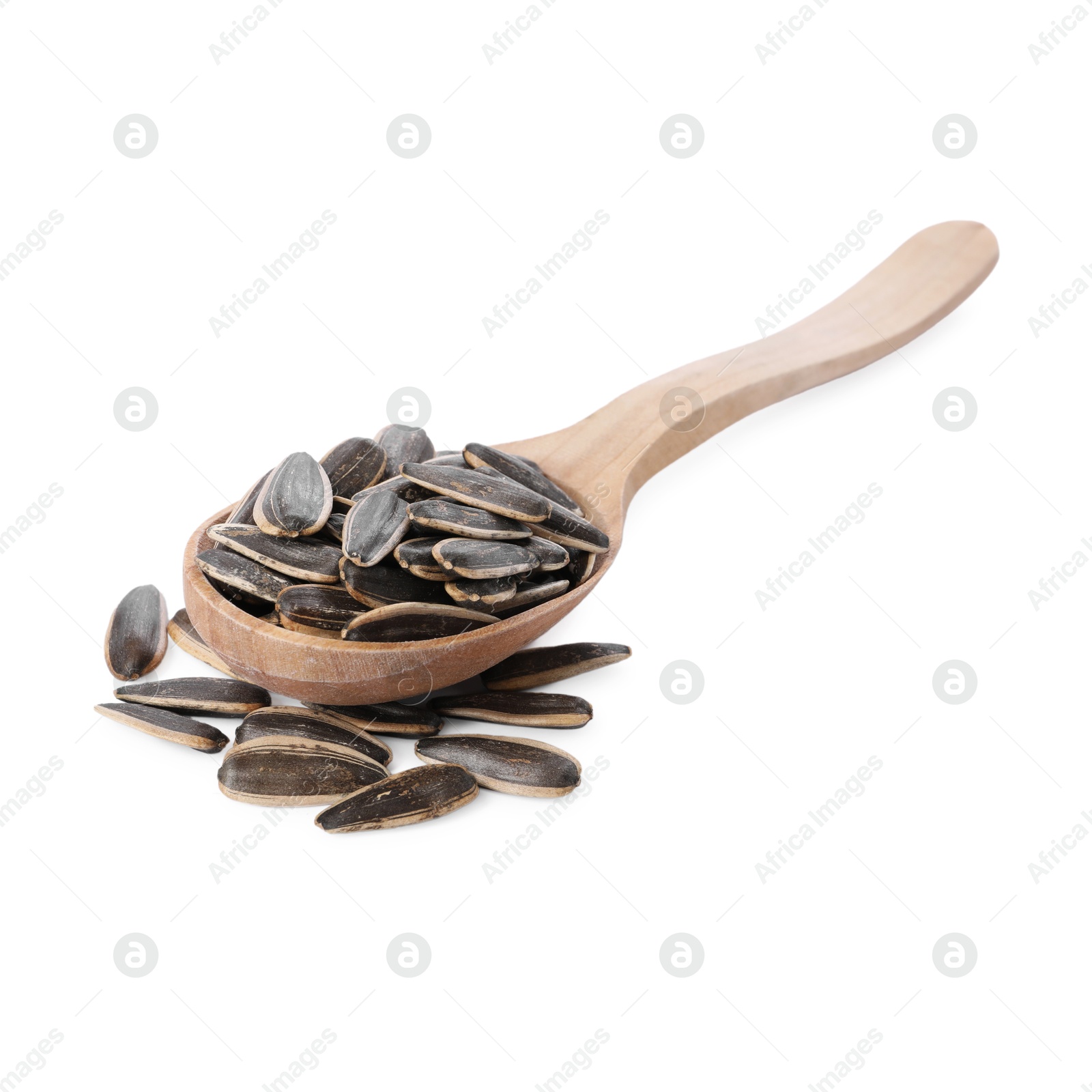 Photo of Sunflower seeds in wooden spoon isolated on white