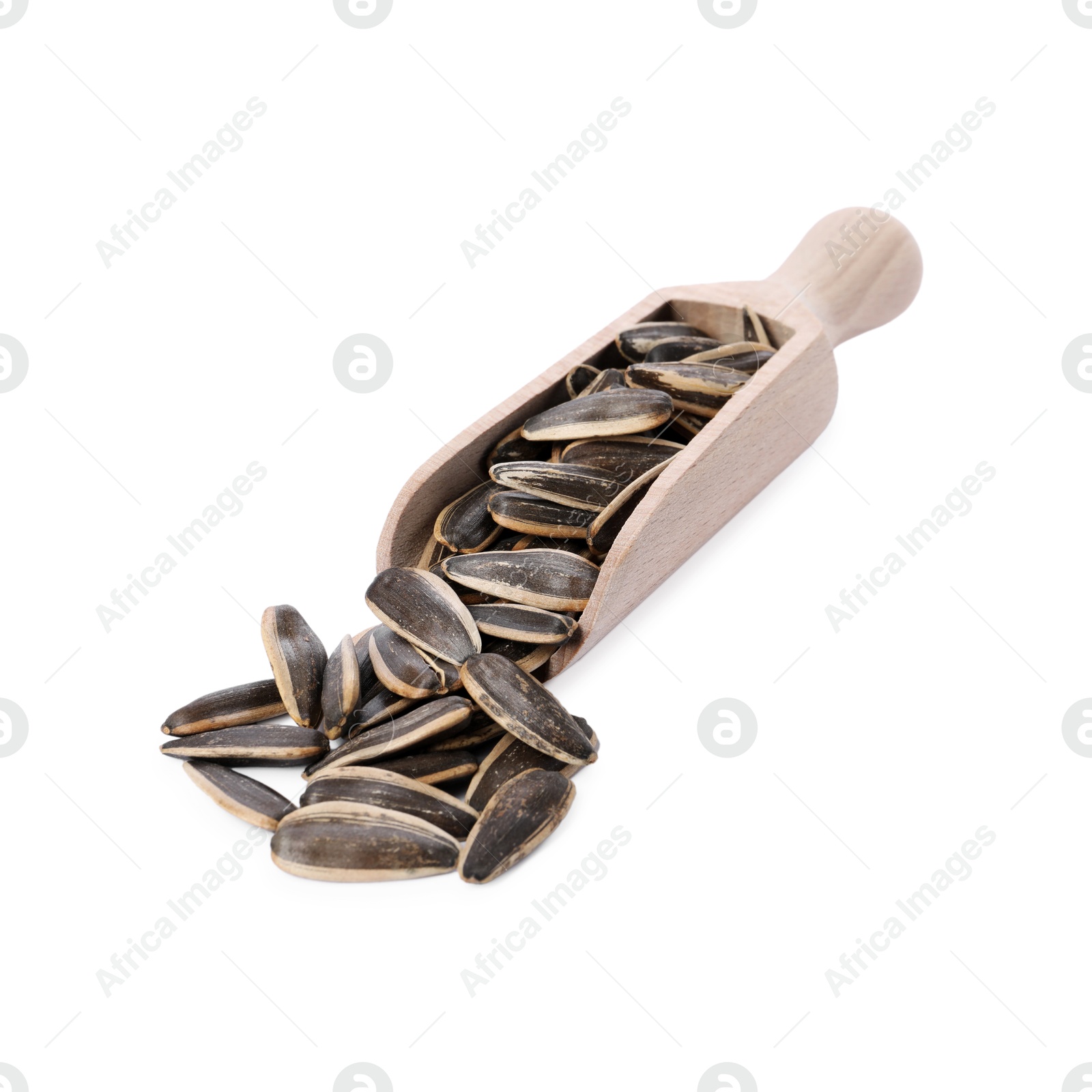 Photo of Sunflower seeds in wooden scoop isolated on white