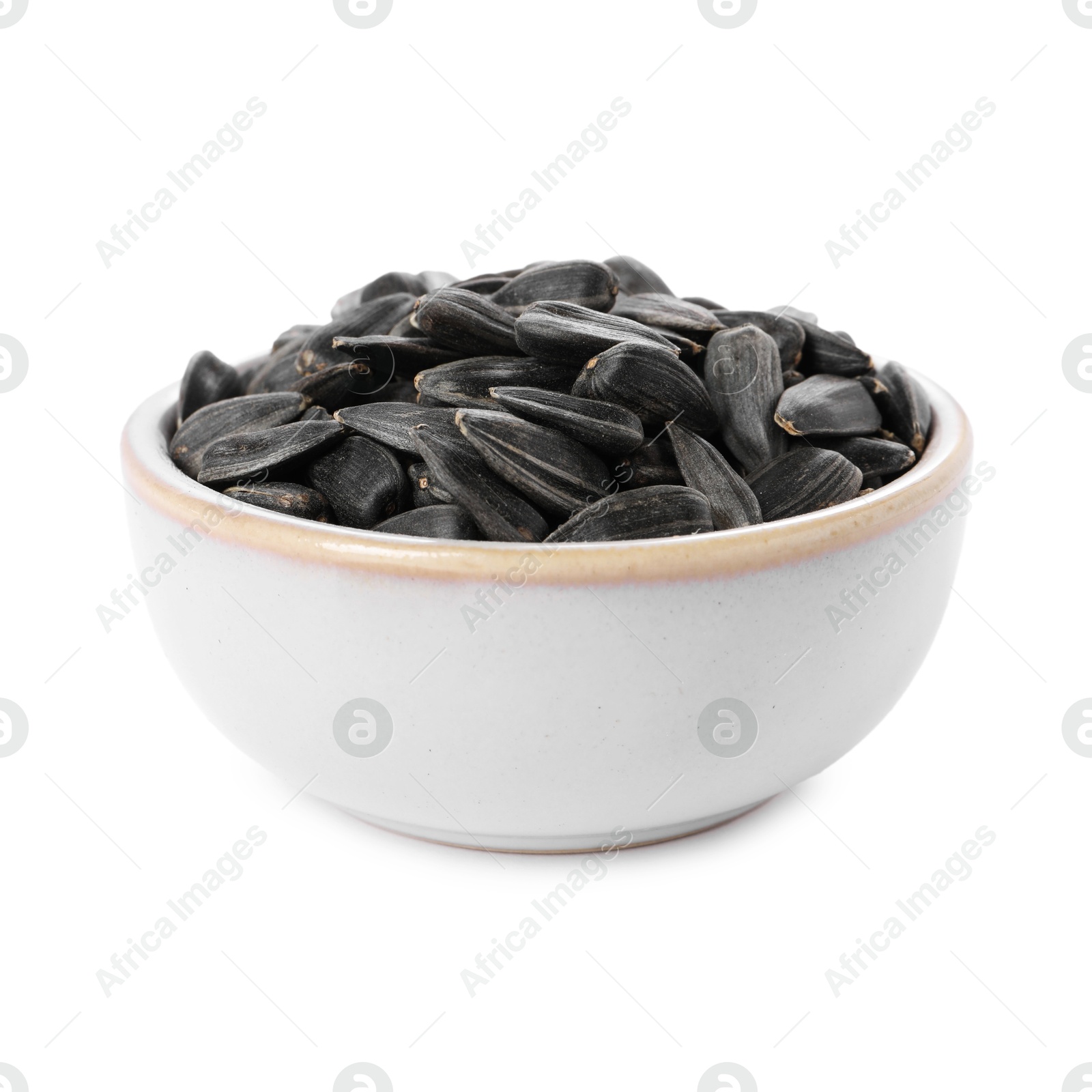 Photo of Sunflower seeds in bowl isolated on white