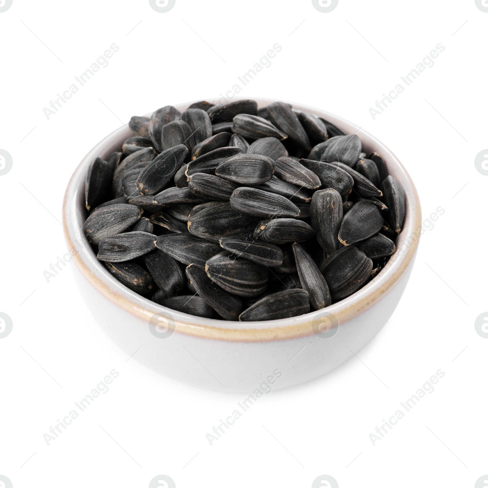 Photo of Sunflower seeds in bowl isolated on white