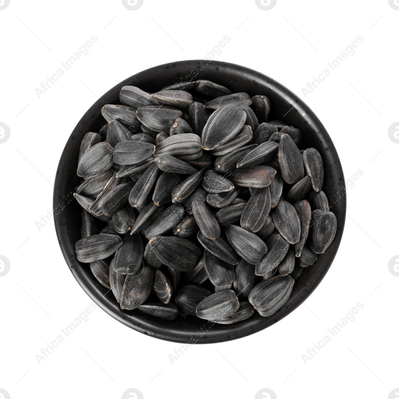 Photo of Sunflower seeds in bowl isolated on white, top view