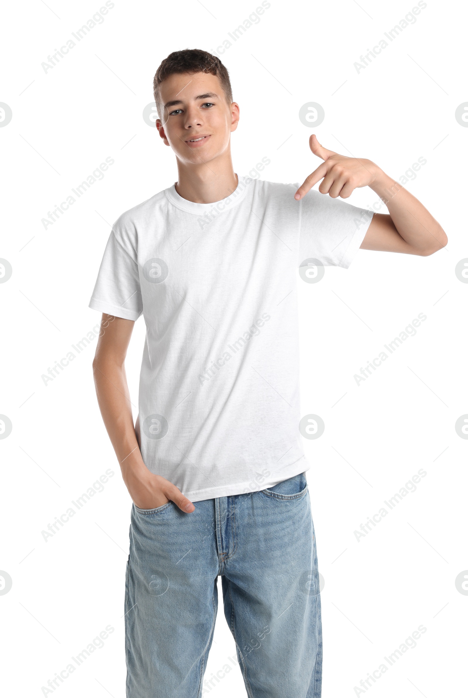 Photo of Teenage boy wearing t-shirt on white background