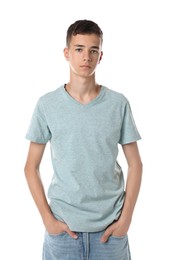 Teenage boy wearing light grey t-shirt on white background