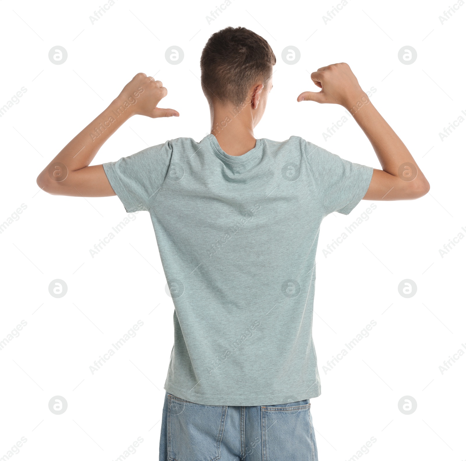 Photo of Teenage boy wearing light grey t-shirt on white background, back view