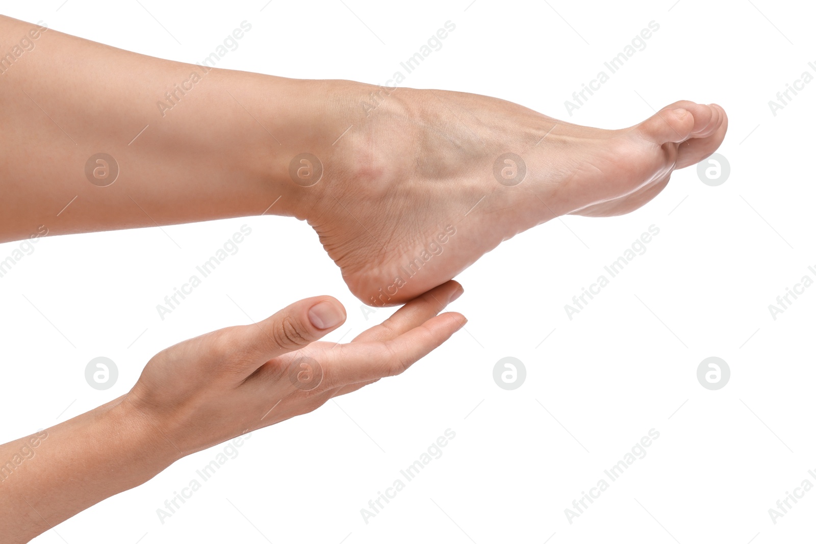 Photo of Woman touching her smooth feet on white background, closeup