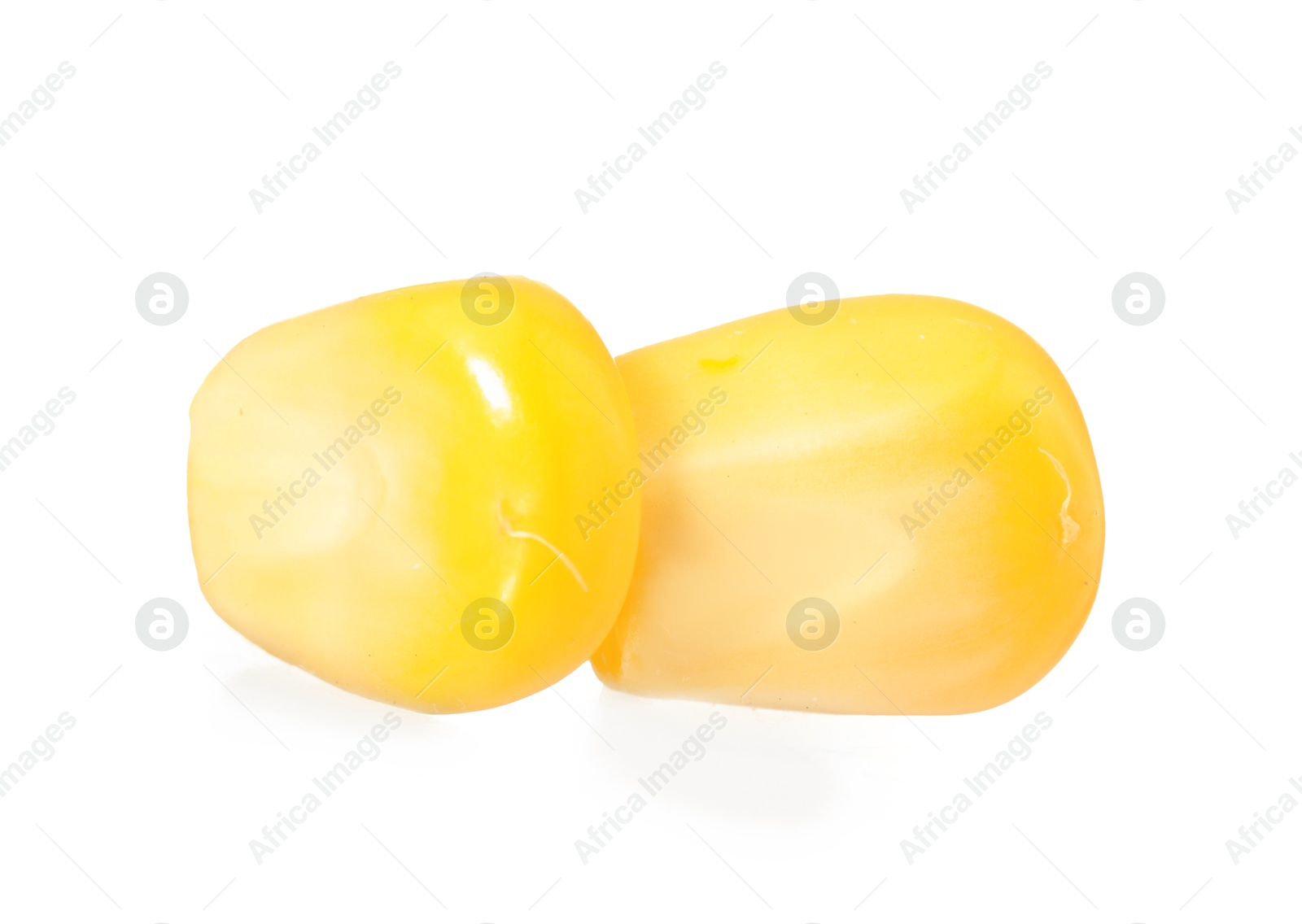 Photo of Fresh ripe corn kernels isolated on white