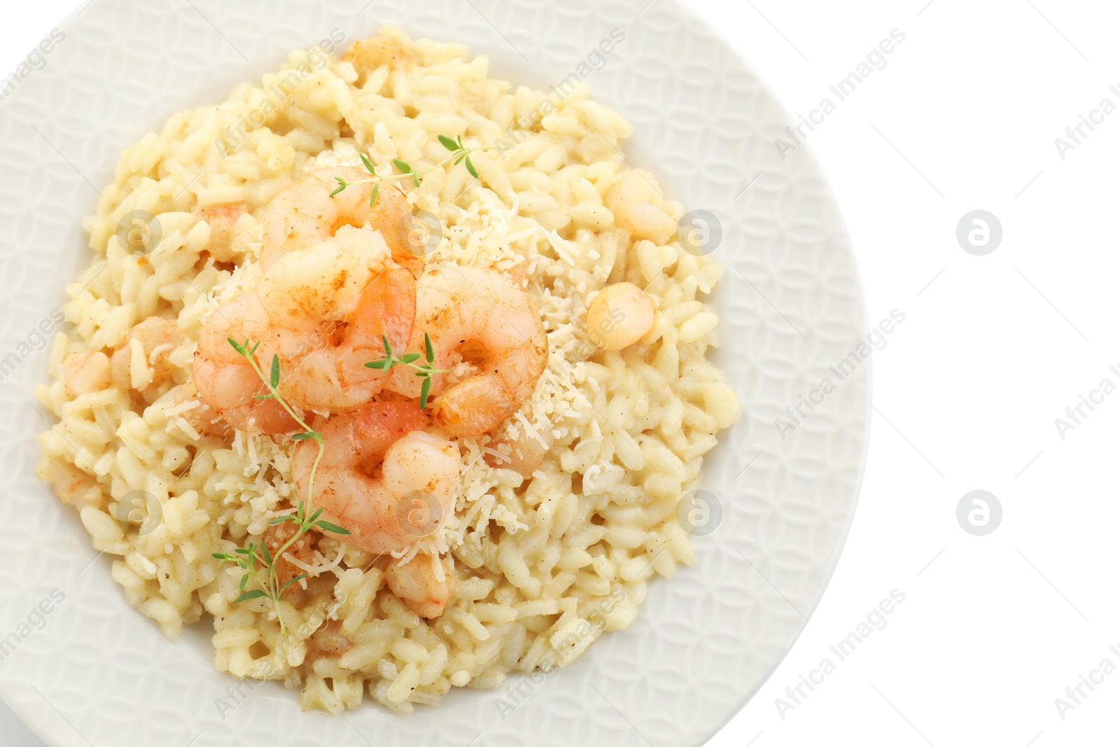 Photo of Delicious risotto with shrimps and cheese isolated on white, top view