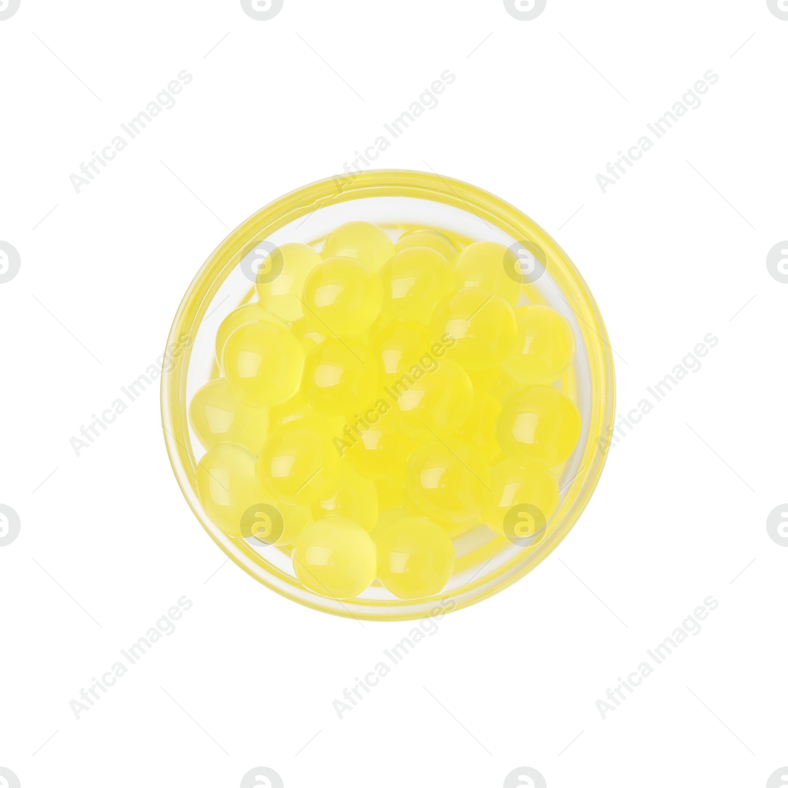 Photo of Bright tapioca pearls in bowl isolated on white, top view