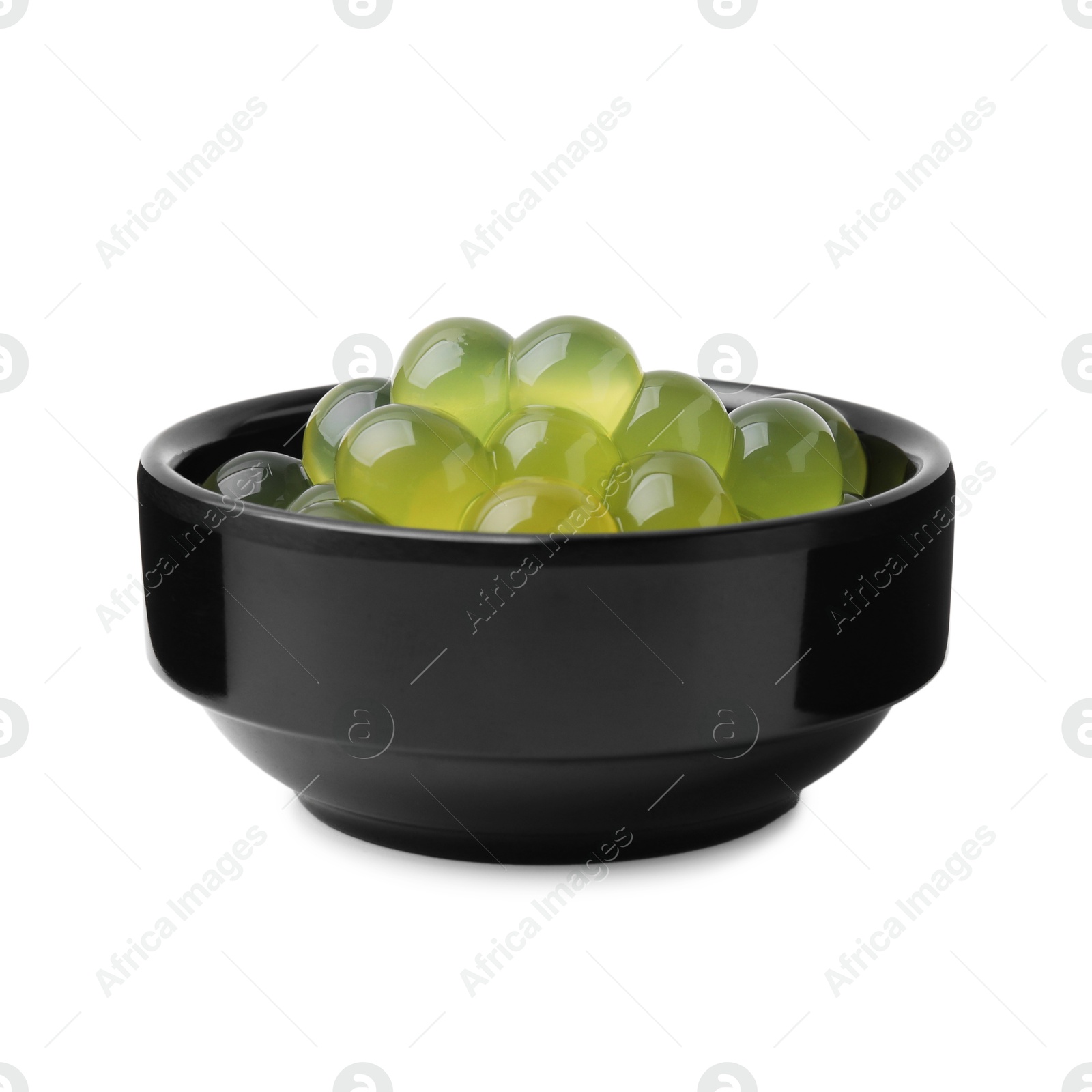 Photo of Bright tapioca pearls in bowl isolated on white