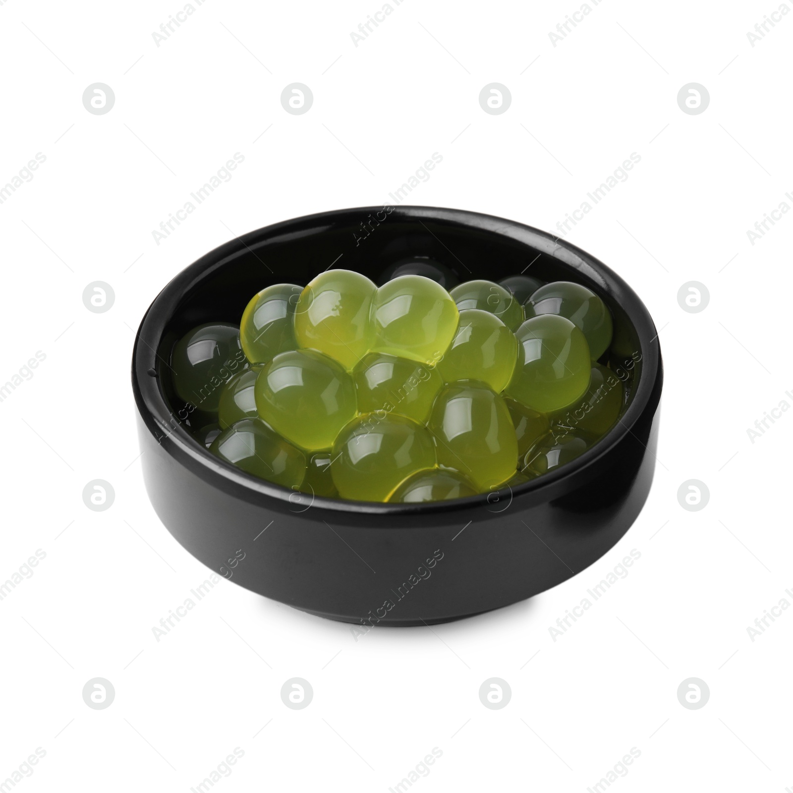 Photo of Bright tapioca pearls in bowl isolated on white