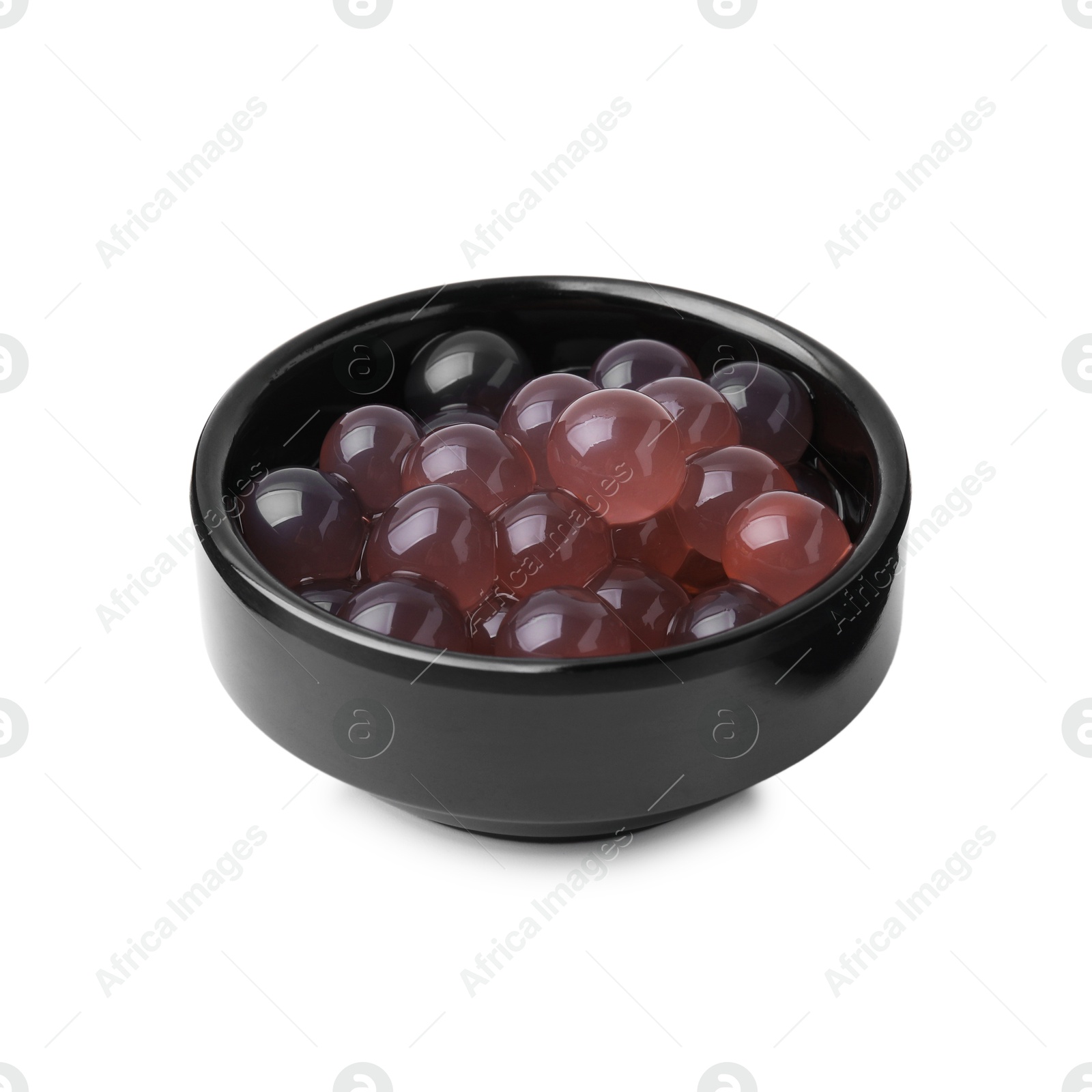 Photo of Bright tapioca pearls in bowl isolated on white