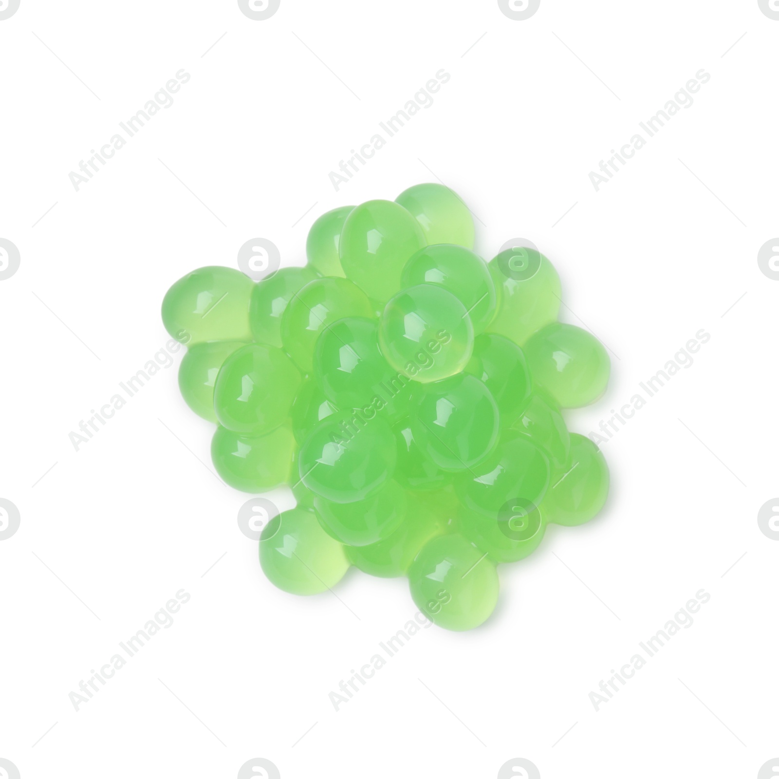 Photo of Pile of bright tapioca pearls isolated on white, top view