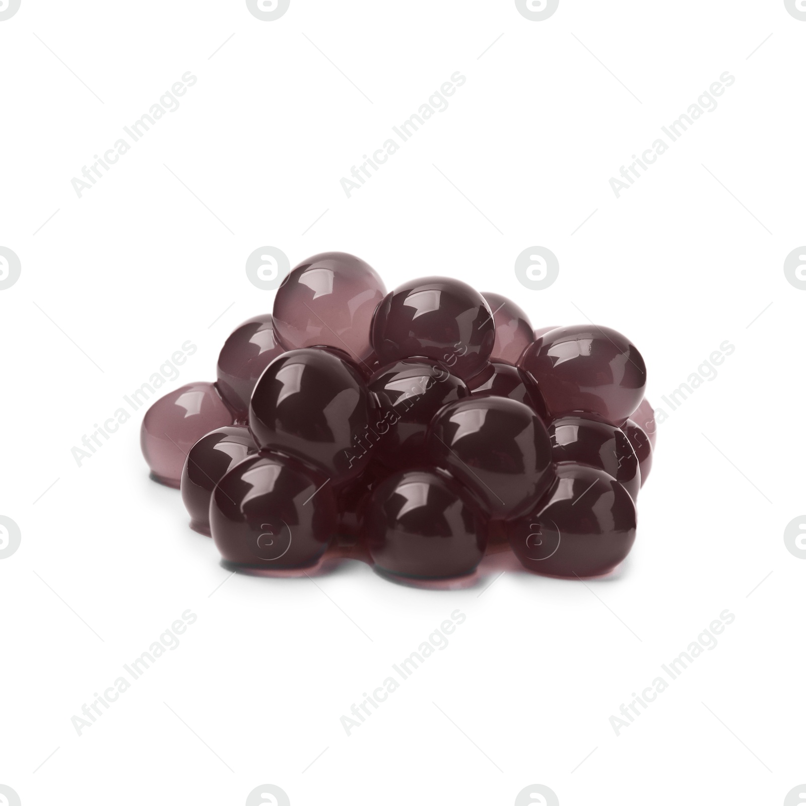 Photo of Pile of dark tapioca pearls isolated on white