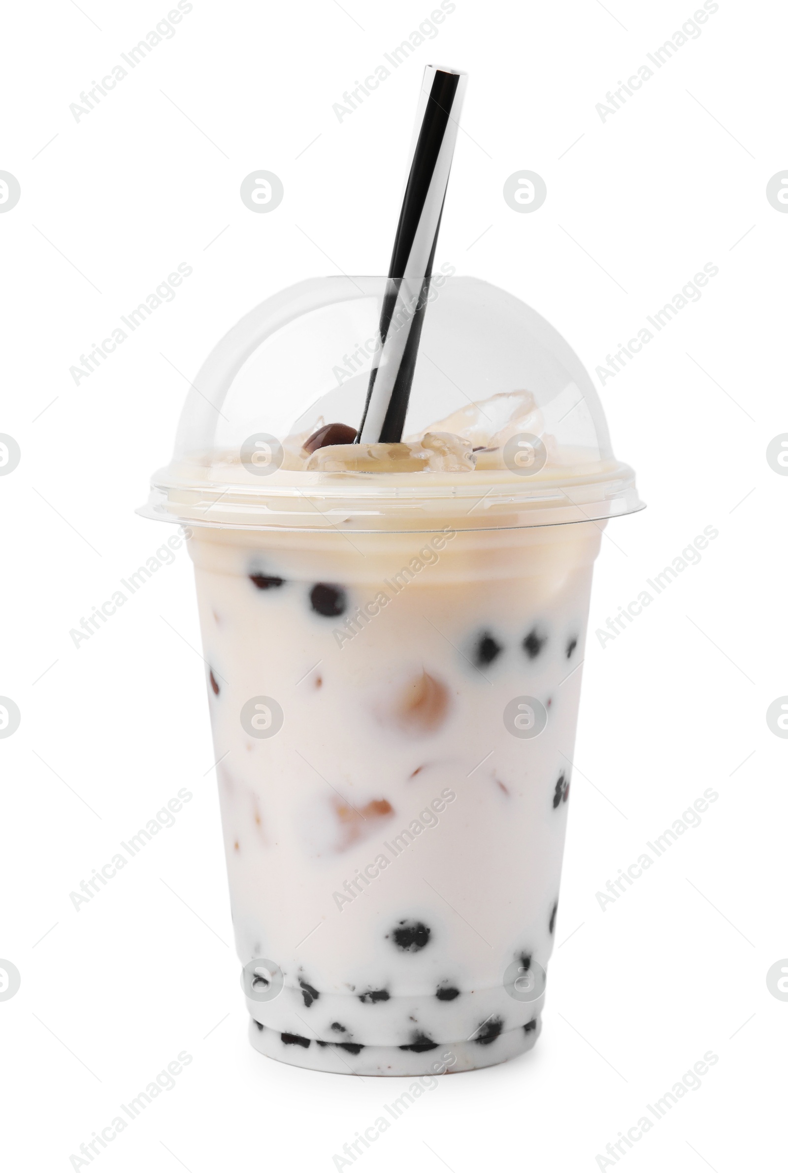 Photo of Tasty milk bubble tea in plastic cup isolated on white