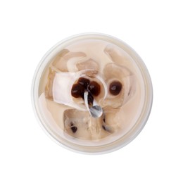 Photo of Tasty milk bubble tea in plastic cup isolated on white, top view