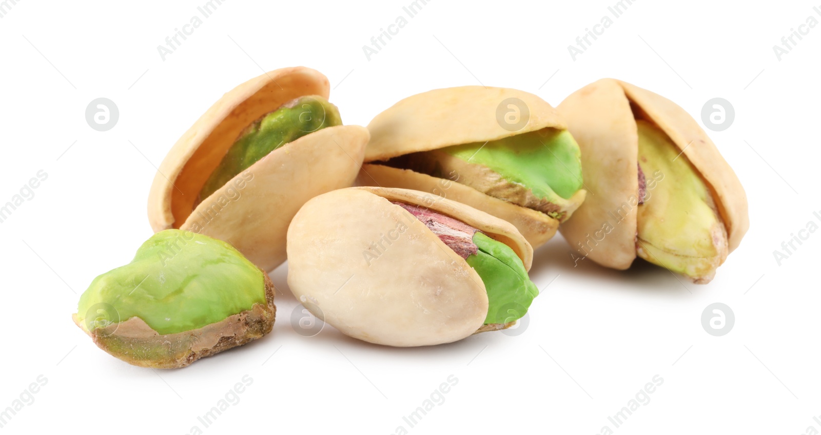 Photo of Many tasty pistachio nuts isolated on white