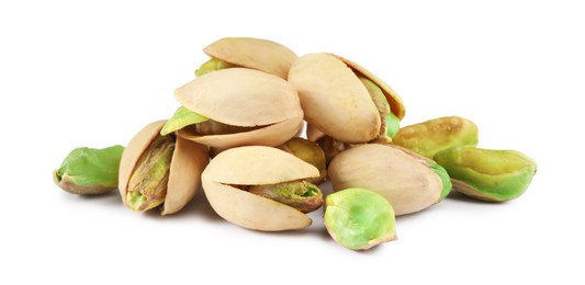 Photo of Heap of tasty pistachio nuts isolated on white