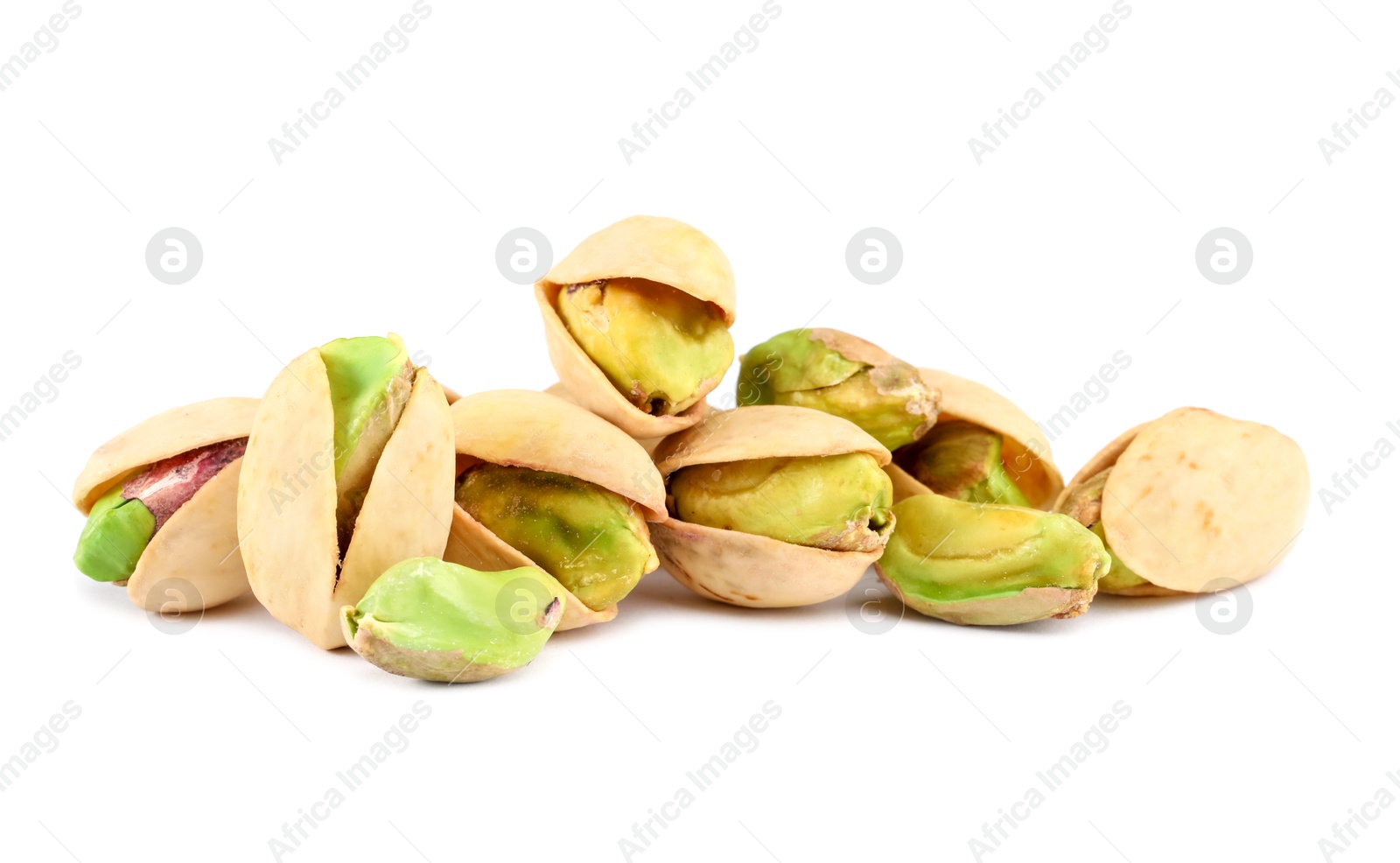 Photo of Heap of tasty pistachio nuts isolated on white