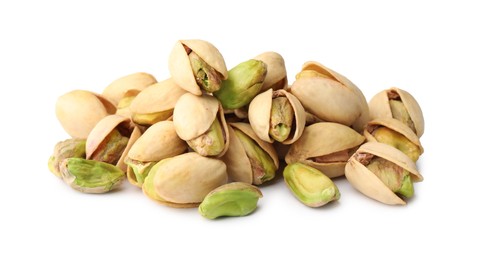 Photo of Heap of tasty pistachio nuts isolated on white