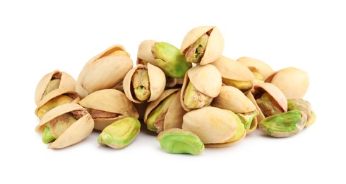 Photo of Heap of tasty pistachio nuts isolated on white