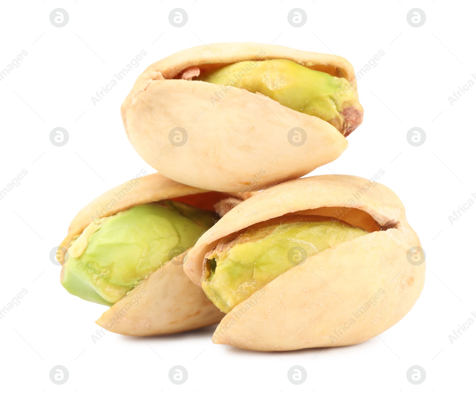 Photo of Three tasty pistachio nuts isolated on white