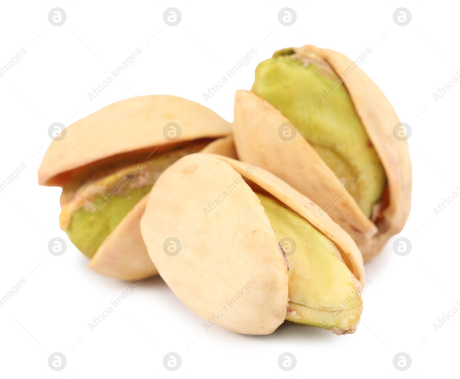 Photo of Three tasty pistachio nuts isolated on white