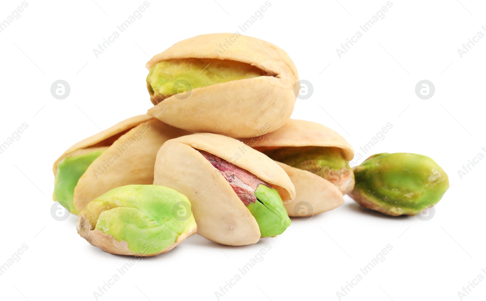 Photo of Many tasty pistachio nuts isolated on white