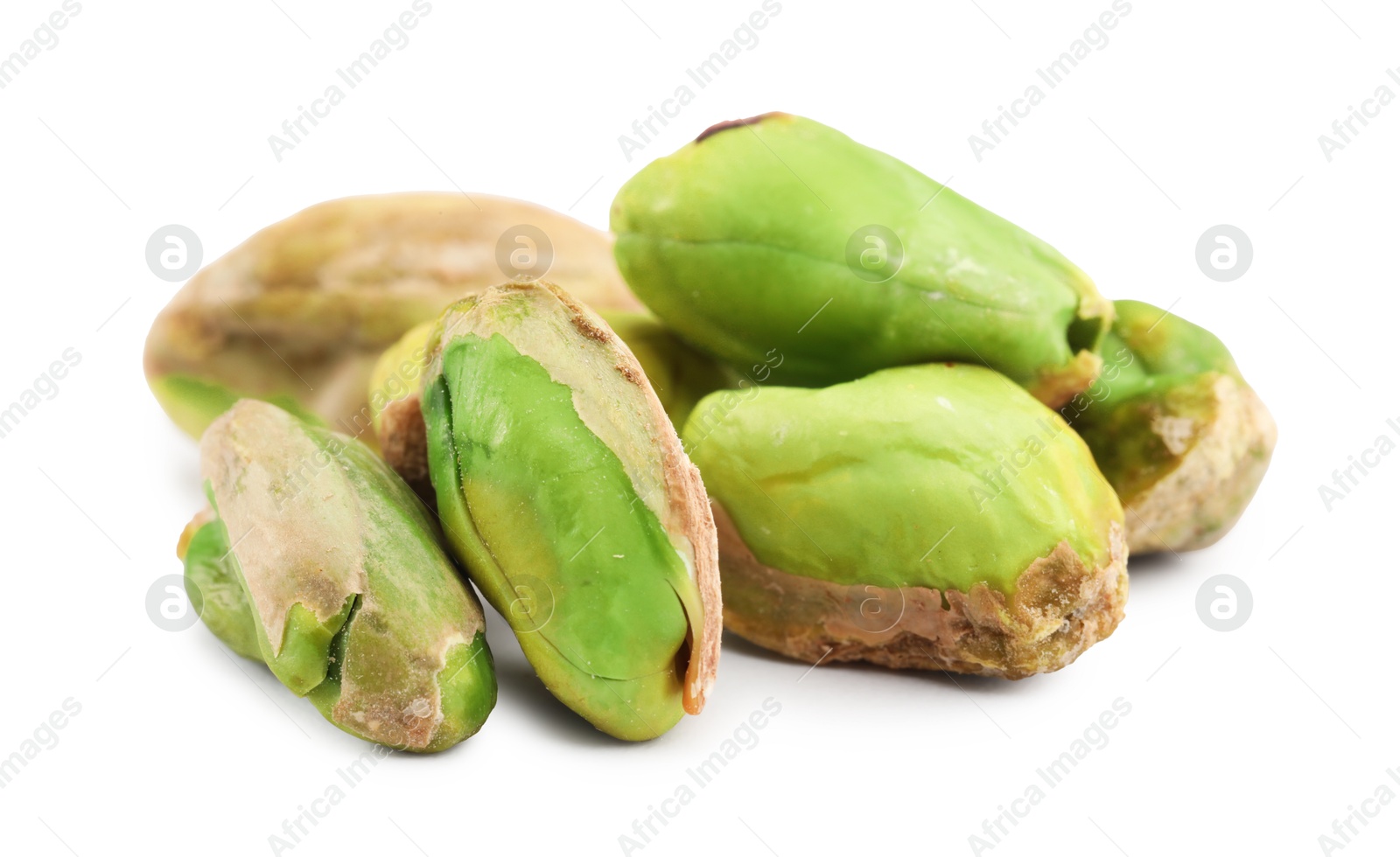 Photo of Tasty peeled pistachio nuts isolated on white