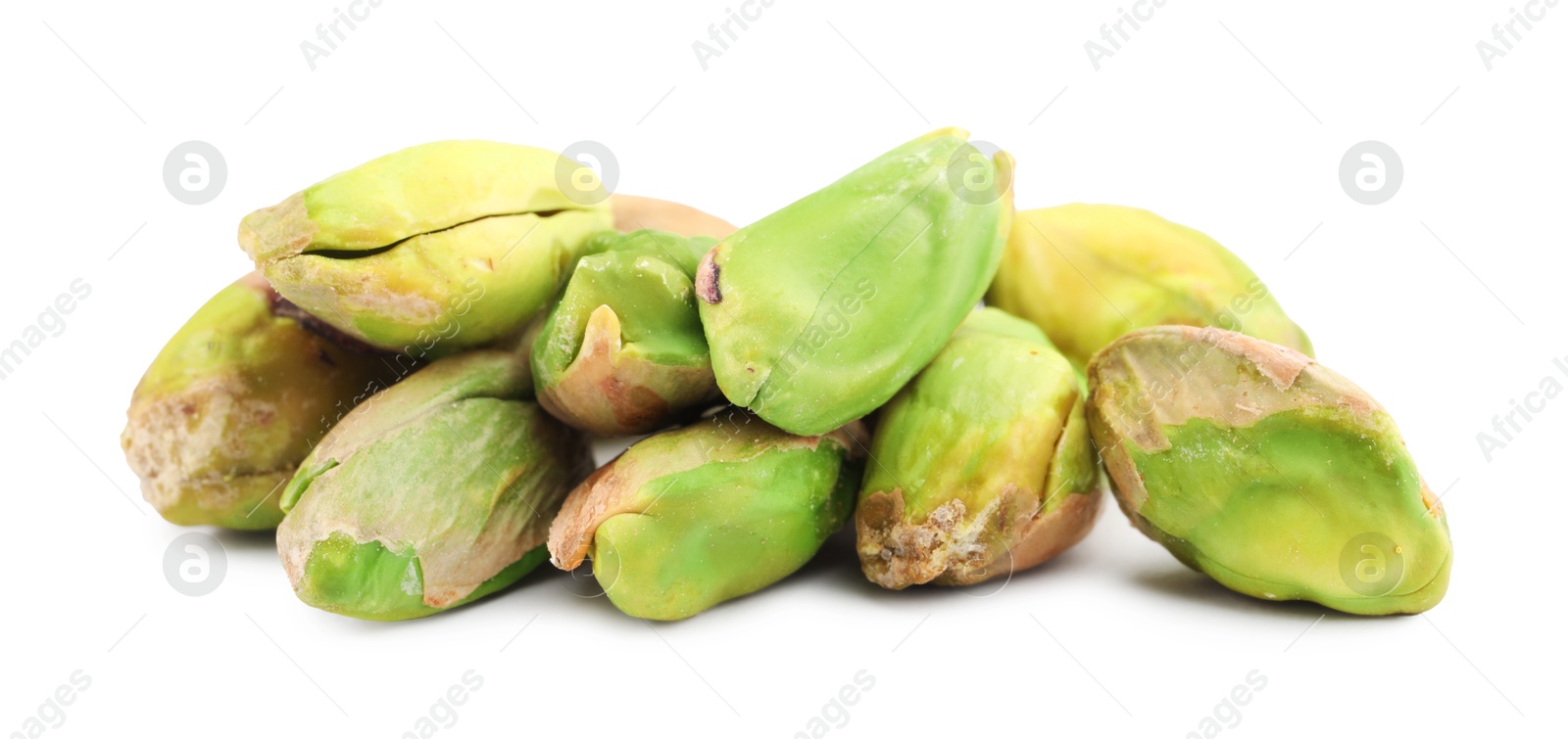 Photo of Tasty peeled pistachio nuts isolated on white