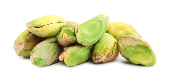 Photo of Tasty peeled pistachio nuts isolated on white