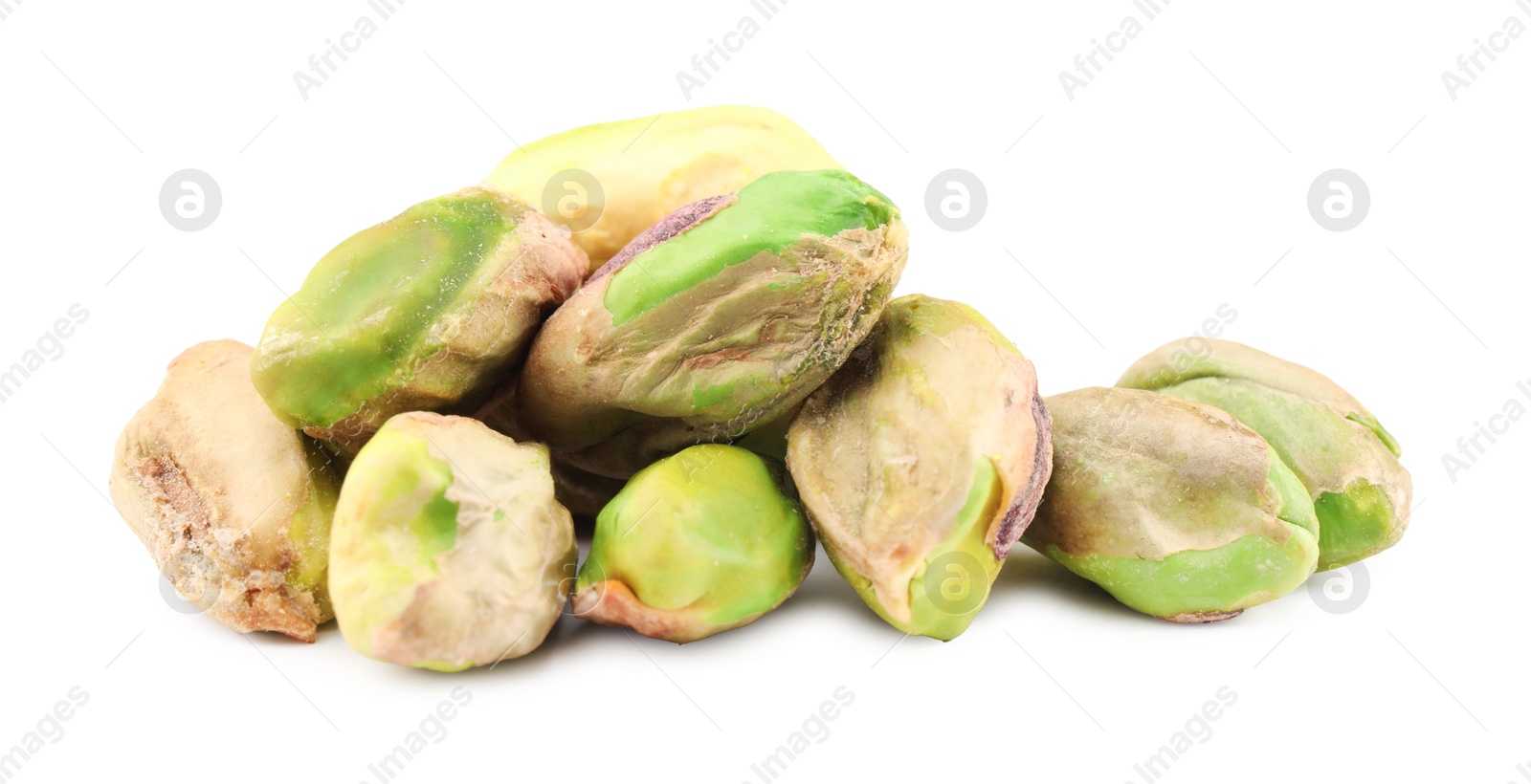 Photo of Tasty peeled pistachio nuts isolated on white