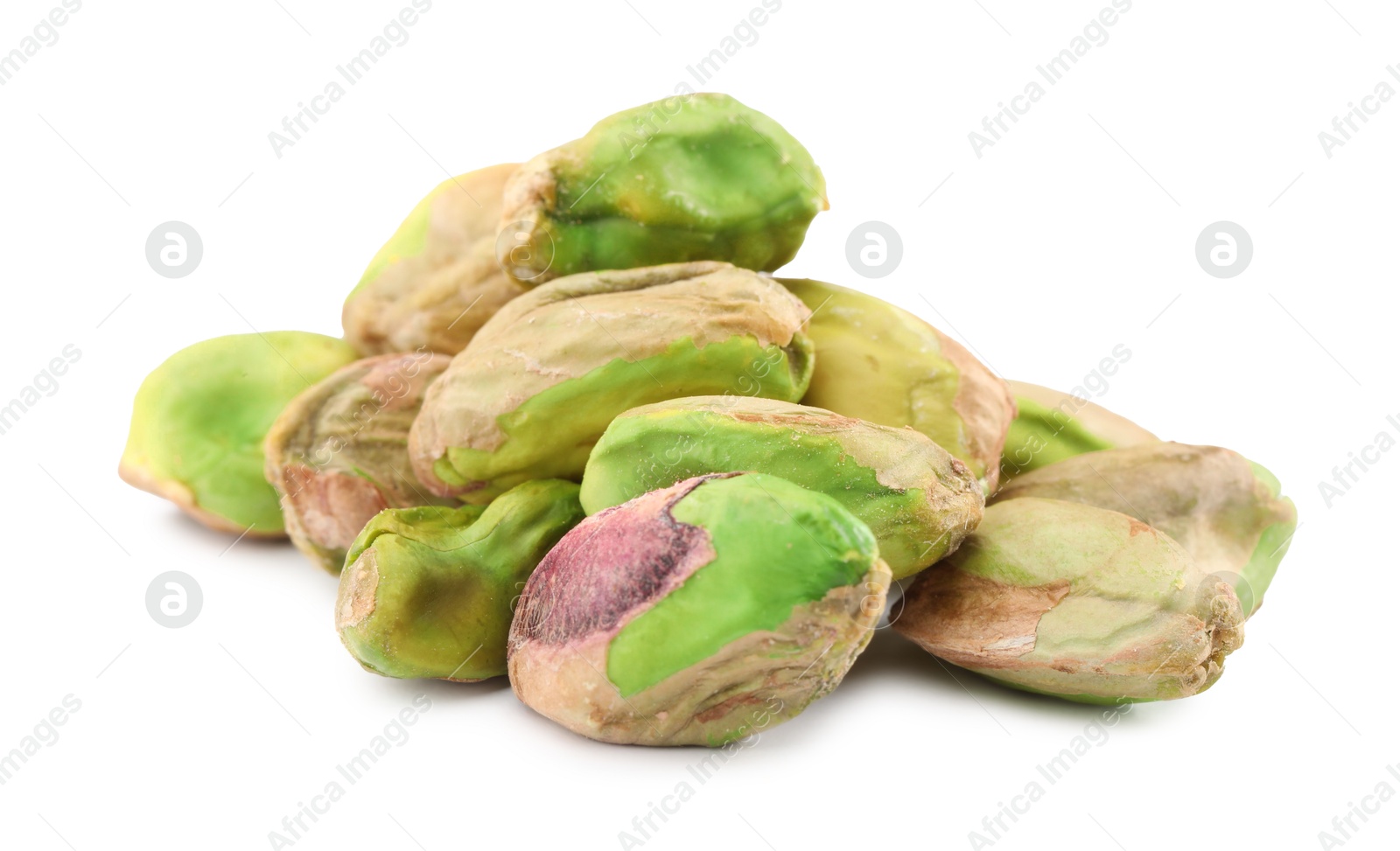 Photo of Tasty peeled pistachio nuts isolated on white