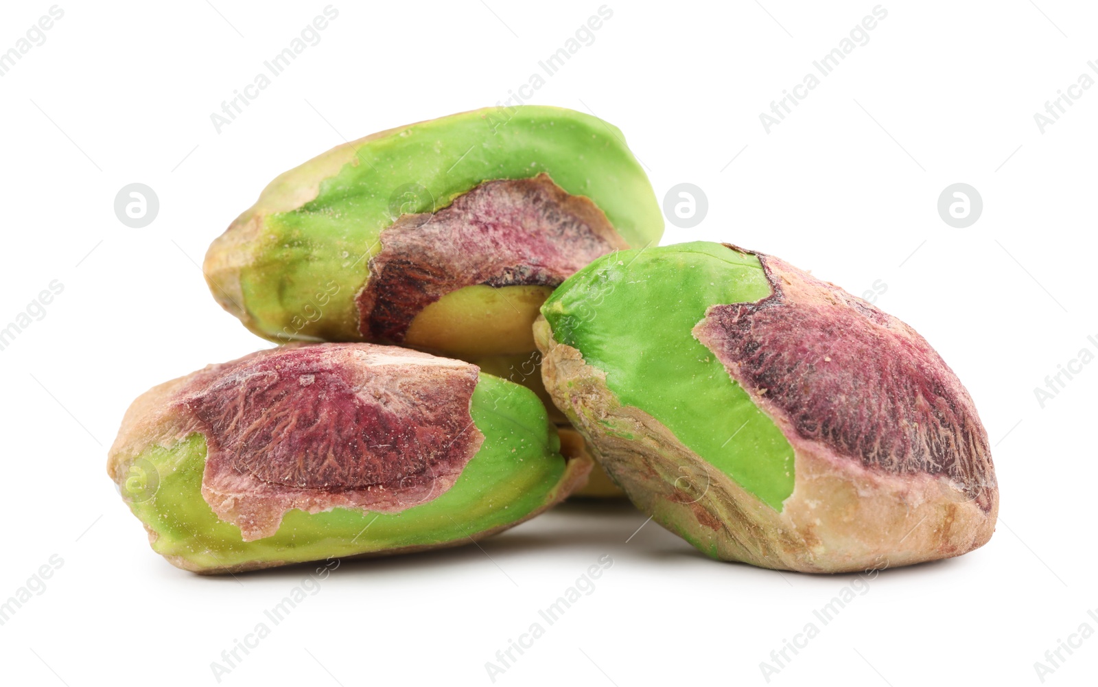 Photo of Tasty peeled pistachio nuts isolated on white