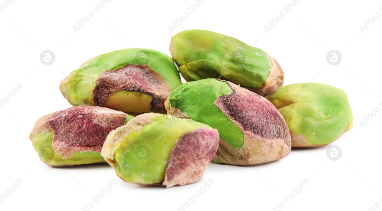 Photo of Tasty peeled pistachio nuts isolated on white