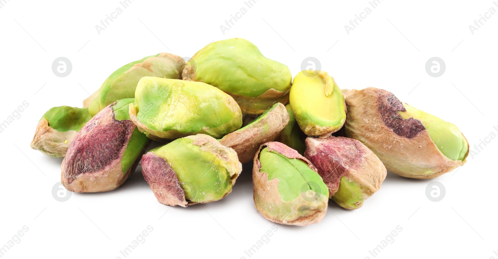 Photo of Tasty peeled pistachio nuts isolated on white