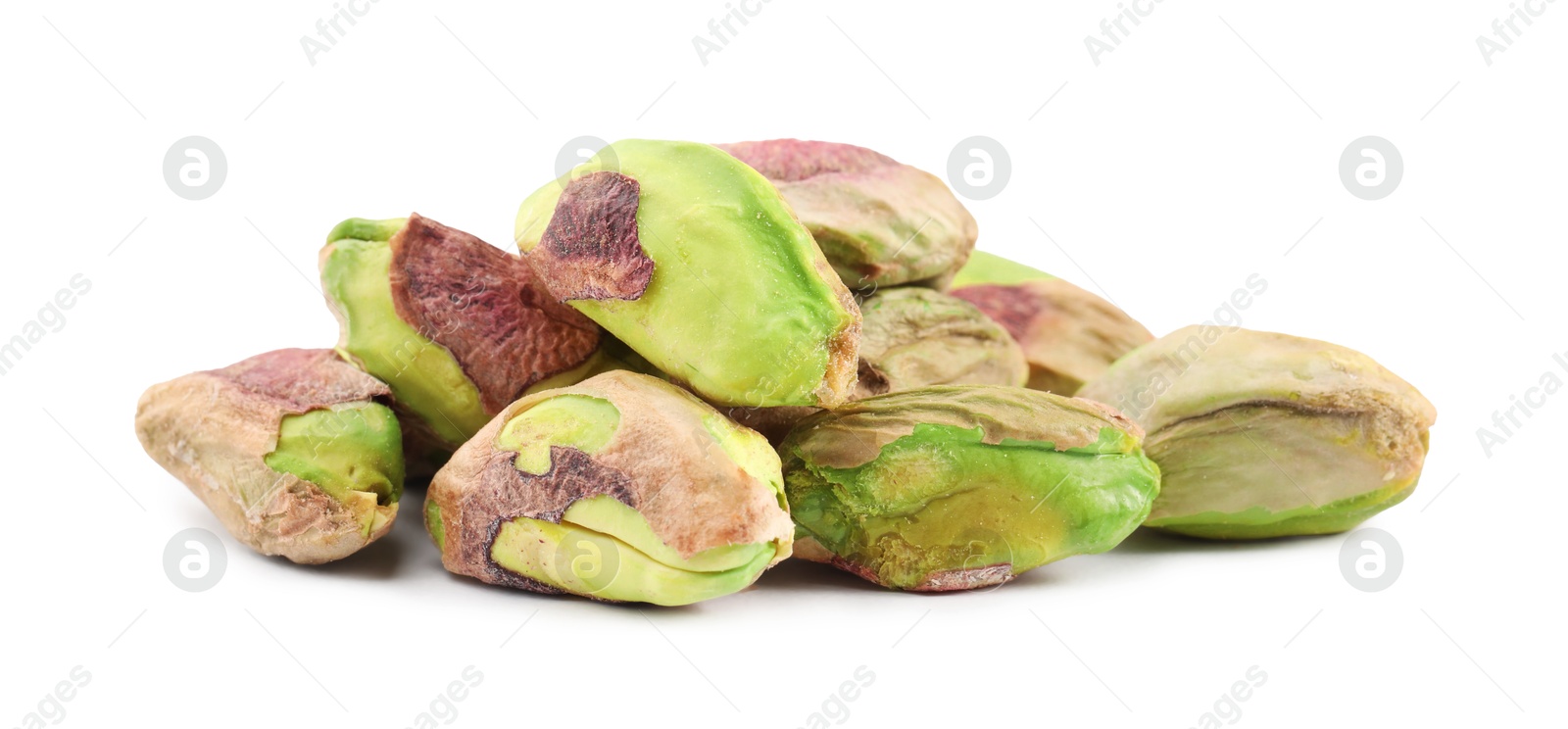 Photo of Tasty peeled pistachio nuts isolated on white