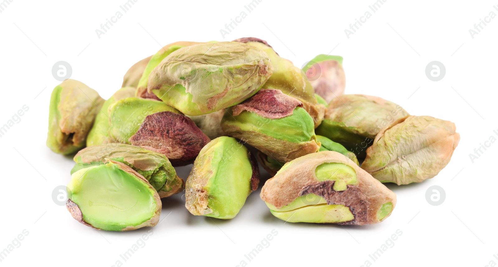 Photo of Tasty peeled pistachio nuts isolated on white