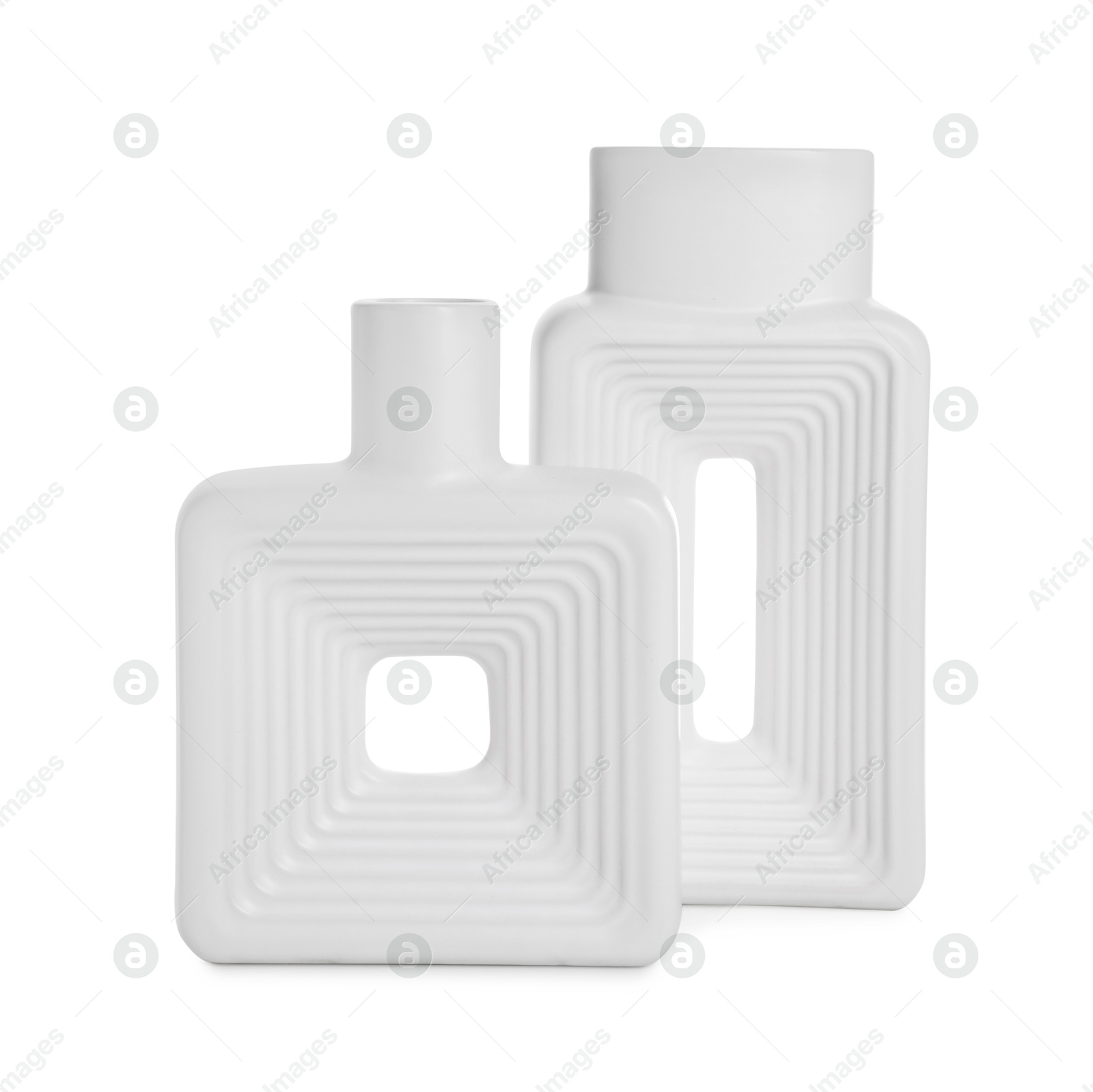 Photo of Two beautiful ceramic vases isolated on white