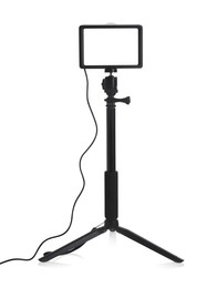 Photo of Professional lighting equipment with tripod isolated on white