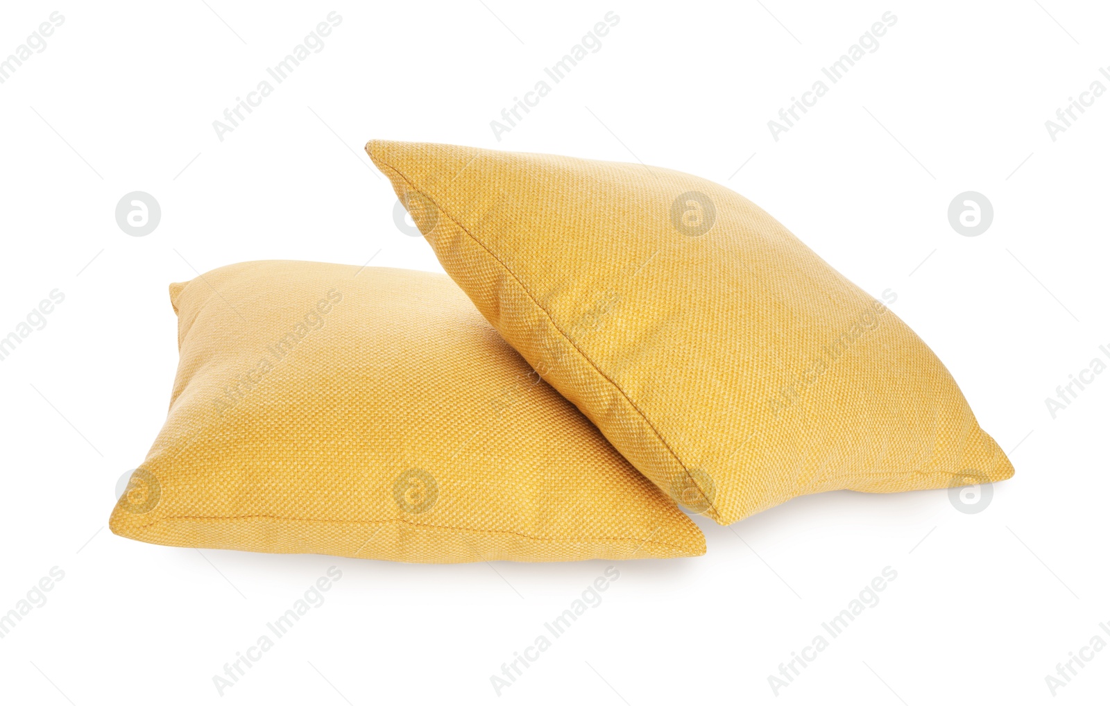 Photo of Two soft color pillows isolated on white