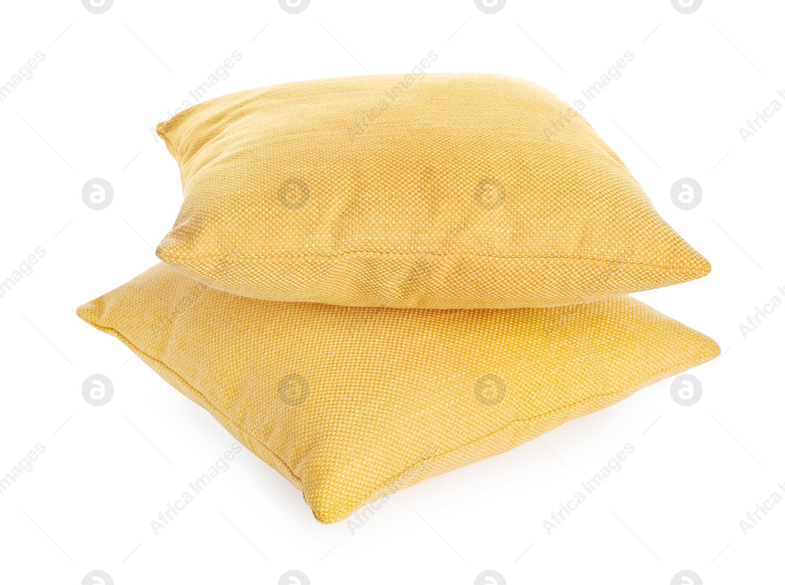 Photo of Two soft color pillows isolated on white