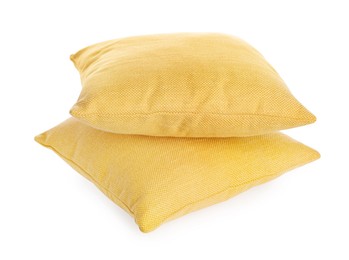 Photo of Two soft color pillows isolated on white