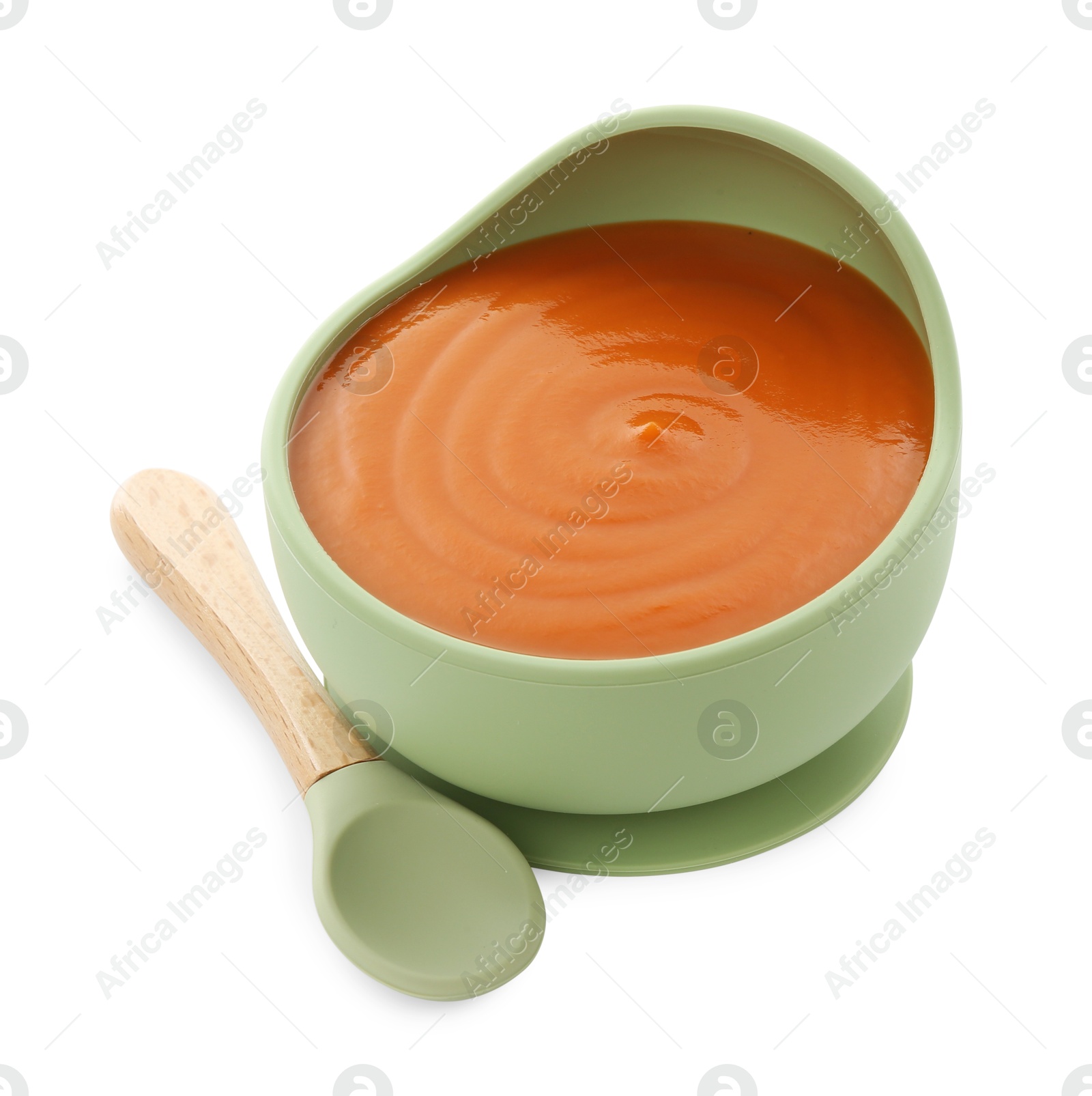 Photo of Tasty baby food in bowl and spoon isolated on white