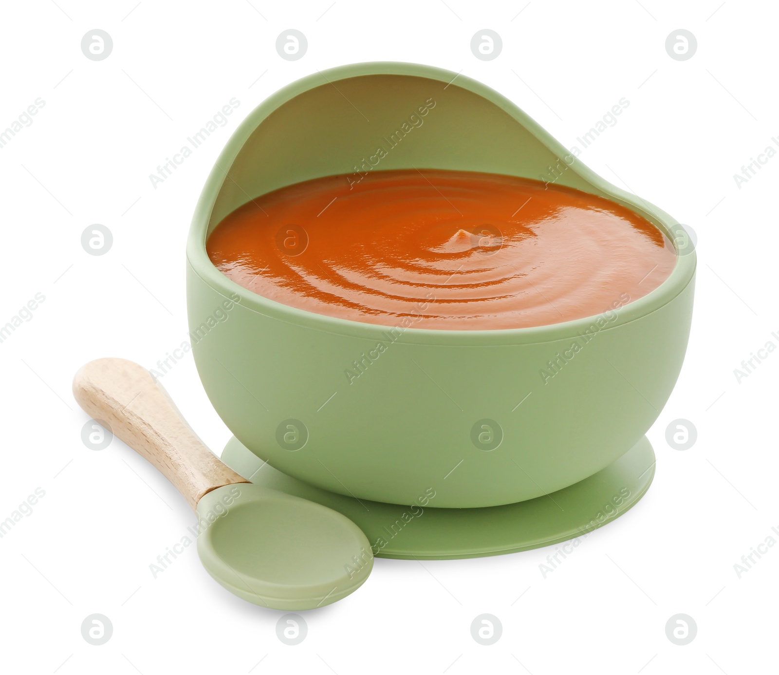 Photo of Tasty baby food in bowl and spoon isolated on white