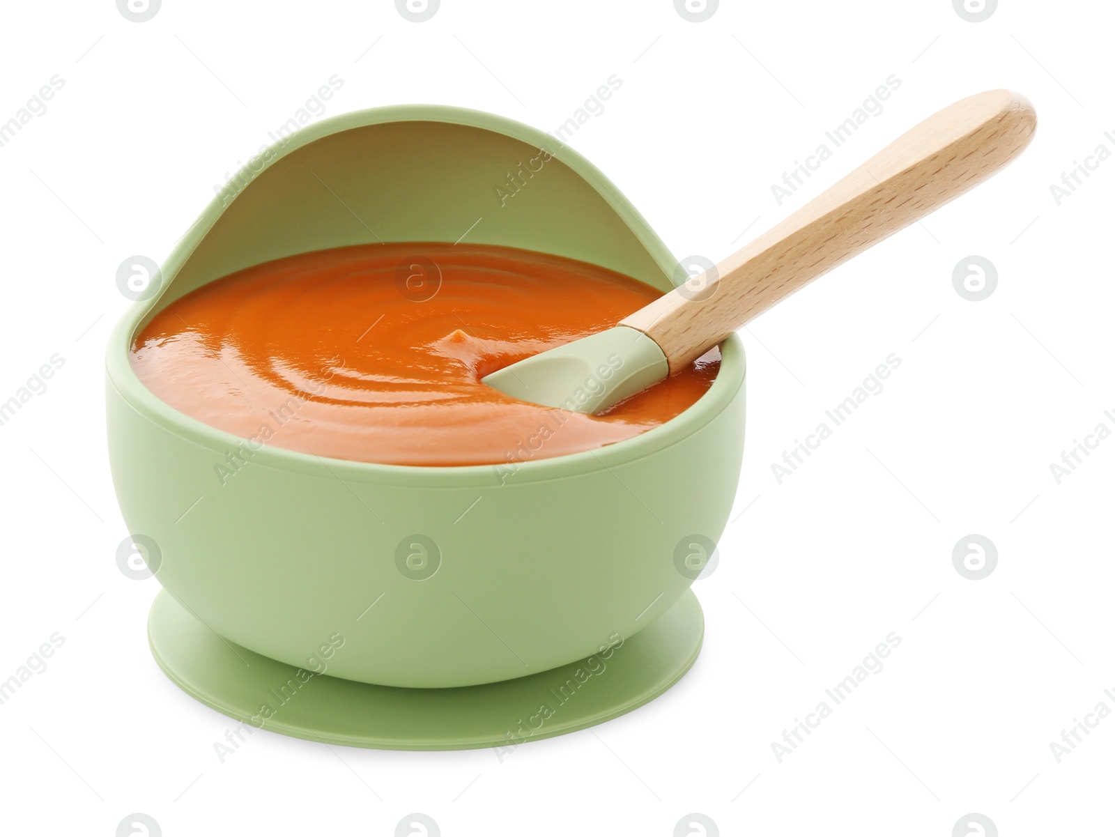 Photo of Tasty baby food and spoon in bowl isolated on white