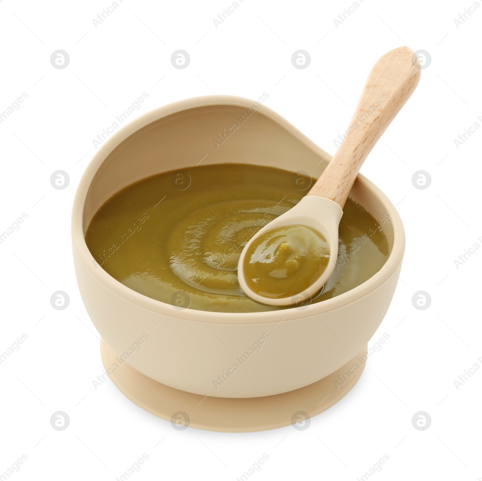 Photo of Tasty baby food in bowl and spoon isolated on white