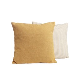 Photo of Two different color pillows isolated on white