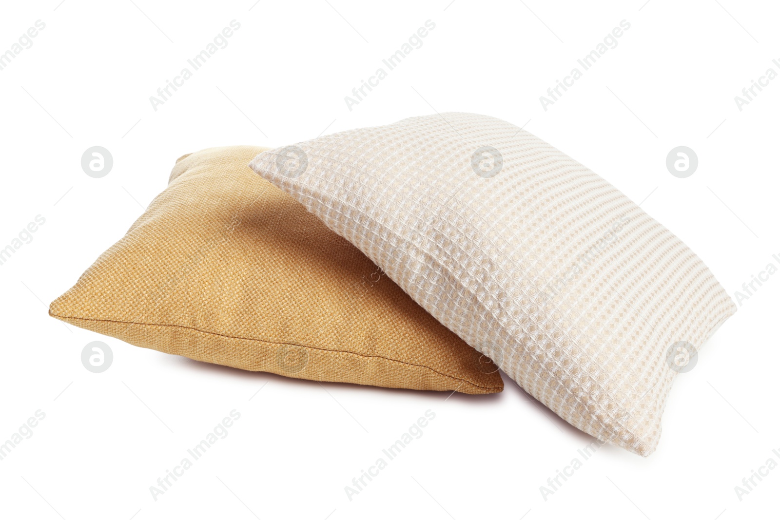 Photo of Two different color pillows isolated on white