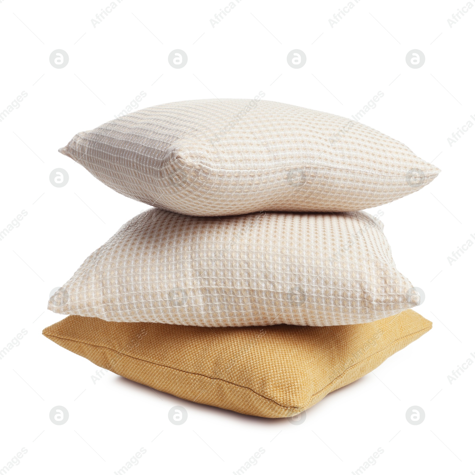 Photo of Stack of different pillows isolated on white