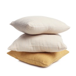 Photo of Stack of different pillows isolated on white